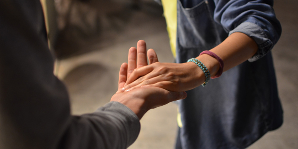 Holding someones had in support - not-for-profit industry